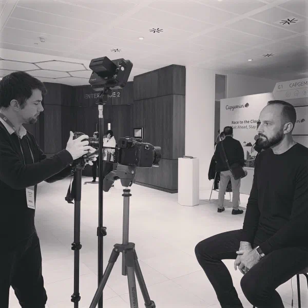 Mario Thomas being interviewed on camera at the AWS Transformation Day, London