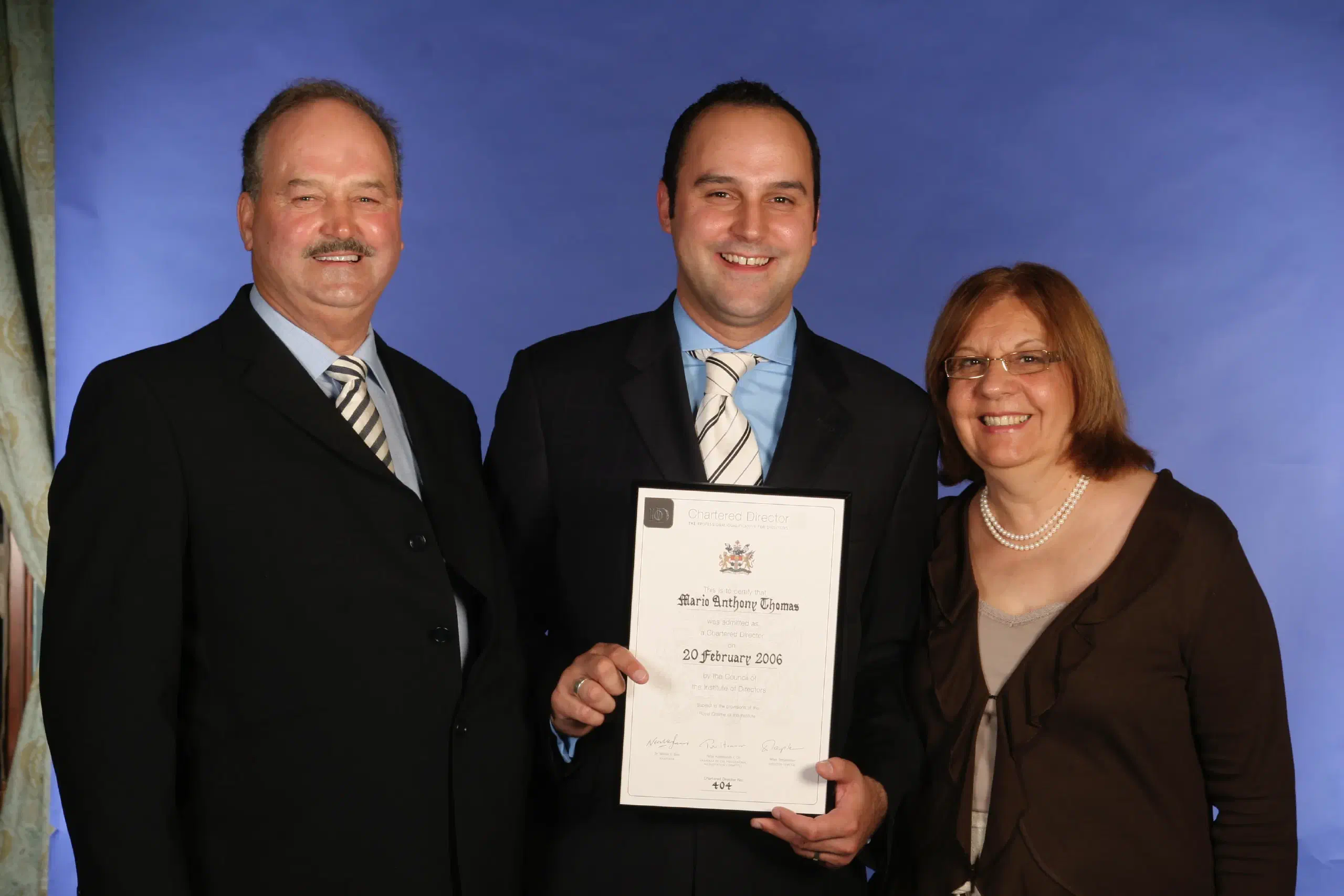 Helen, Anthony, and Mario Thomas at the IoD Chartered Director presentation evening.